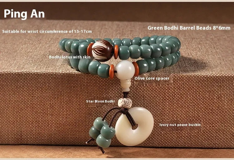 White jade and bodhi seed beaded bracelet with a double ring safety buckle clasp.