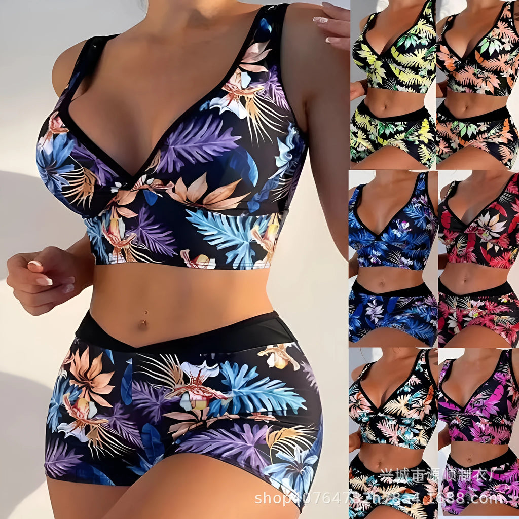 Women's two-piece sleeveless swimsuit with boxer shorts in a multi-colour print.