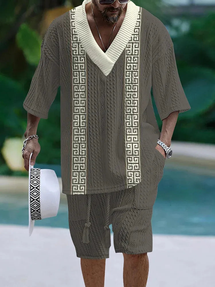 Loose casual short sleeve suit set in polyester fabric showing matching top and shorts