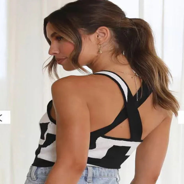 Women's slim fit U-neck camisole in grass green with a midriff cut-out detail.