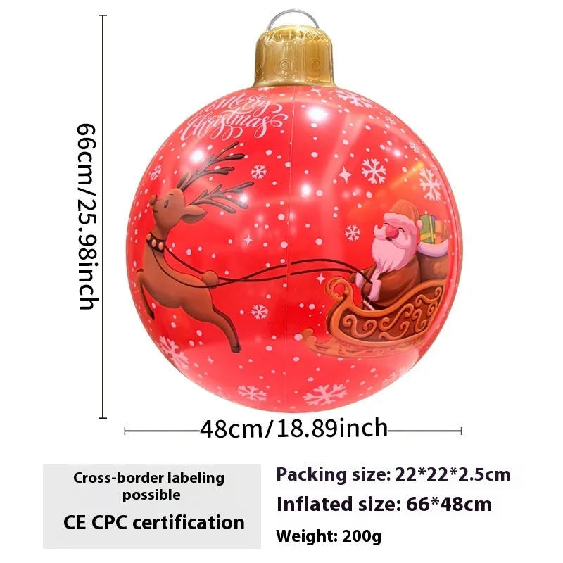Large inflatable Christmas ball decoration with LED lights in garden setting