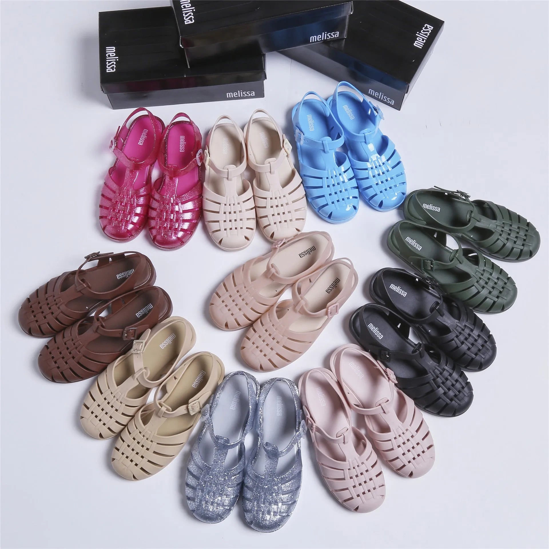 Vintage weave Roman sandals in PVC with buckle fastener, shown in a choice of ten colours.