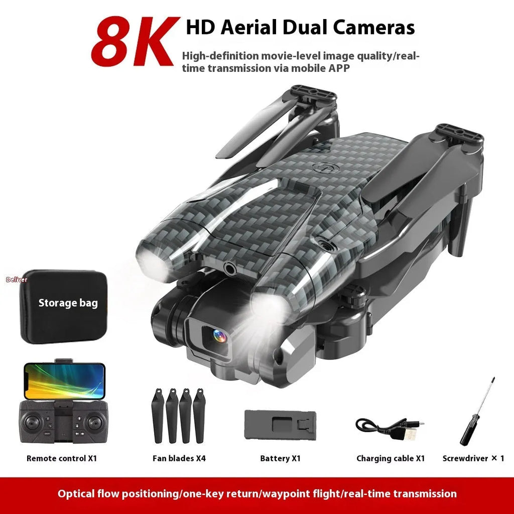 S138 black carbon fibre folding drone with propellers extended, showing dual camera and obstacle avoidance sensors.