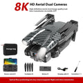 S138 black carbon fibre folding drone with propellers extended, showing dual camera and obstacle avoidance sensors.