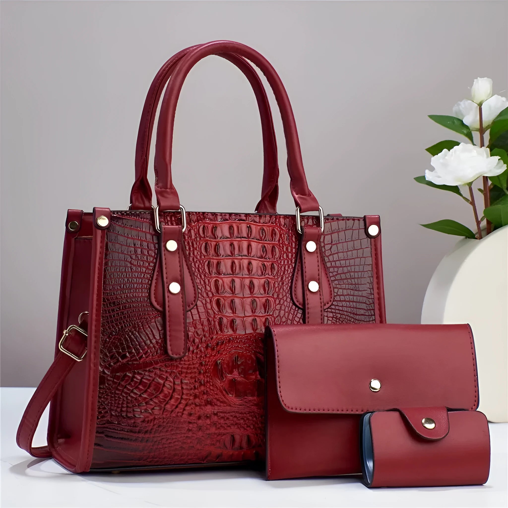 Three-piece PU bag set in chosen colour showing bucket crossbody bag, matching wallet, and card holder.