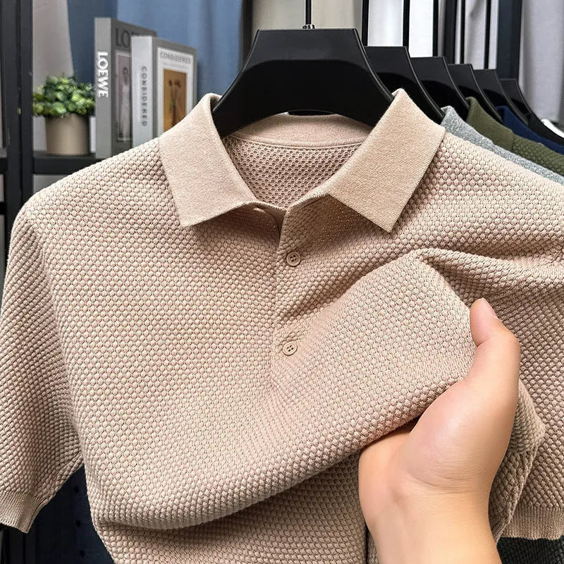Loose fit pure cotton short sleeve pullover sweater in grey on a hanger.
