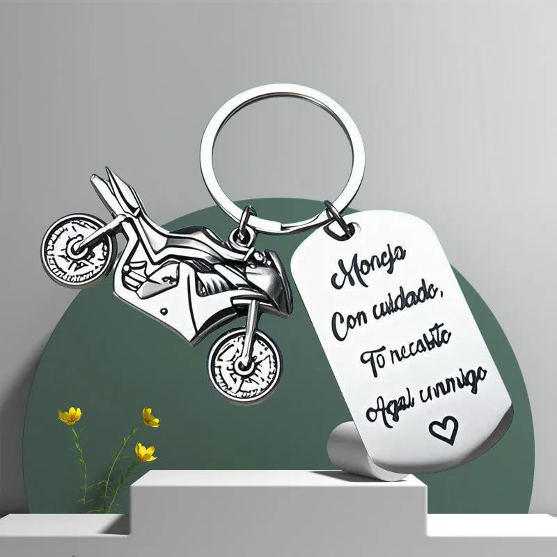 Stainless steel motorcycle keychain with metal construction and flannel storage bag