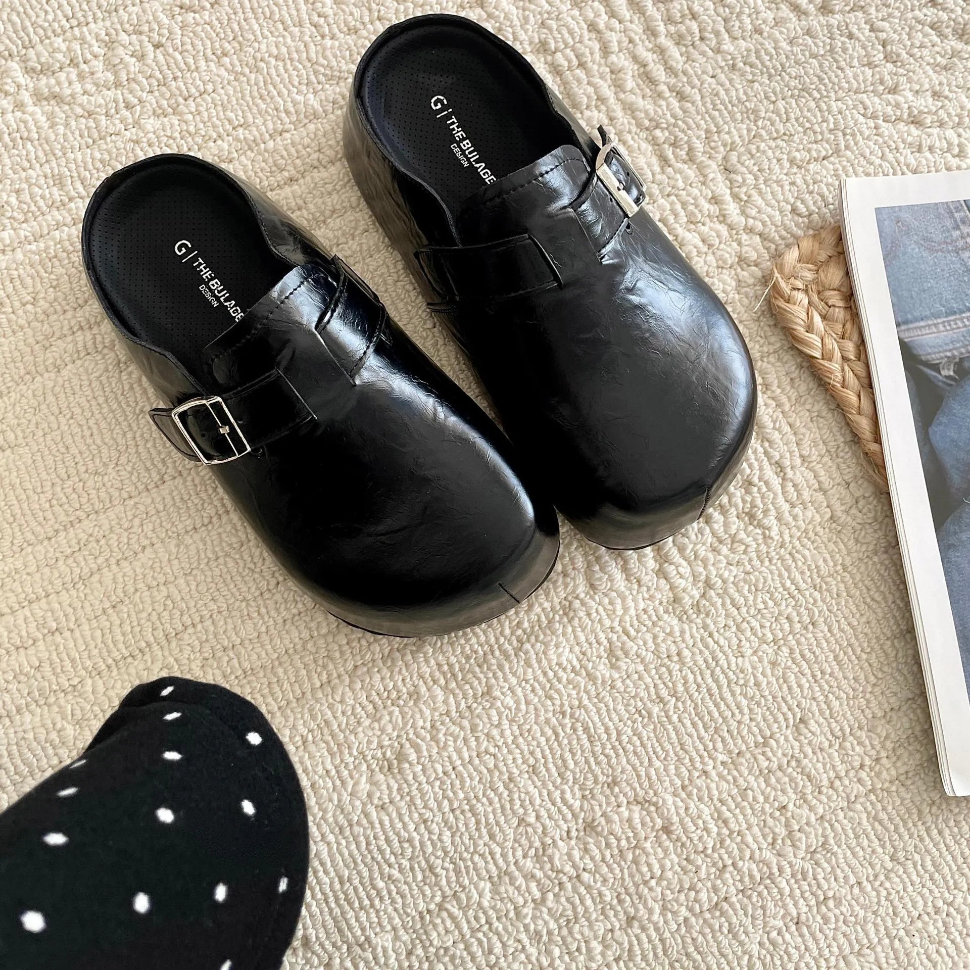 Flat buckle casual sneakers in yellow, black, silver, and creamy-white colours with rounded toe shape