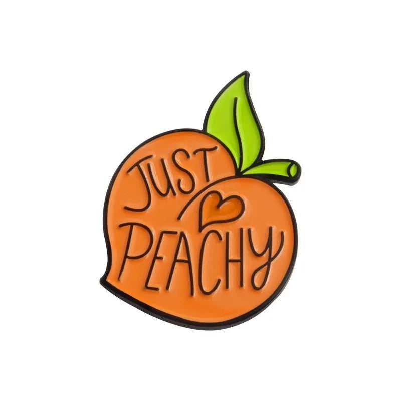 Colourful cartoon fruit design metal brooch with letters on a zinc alloy pin.