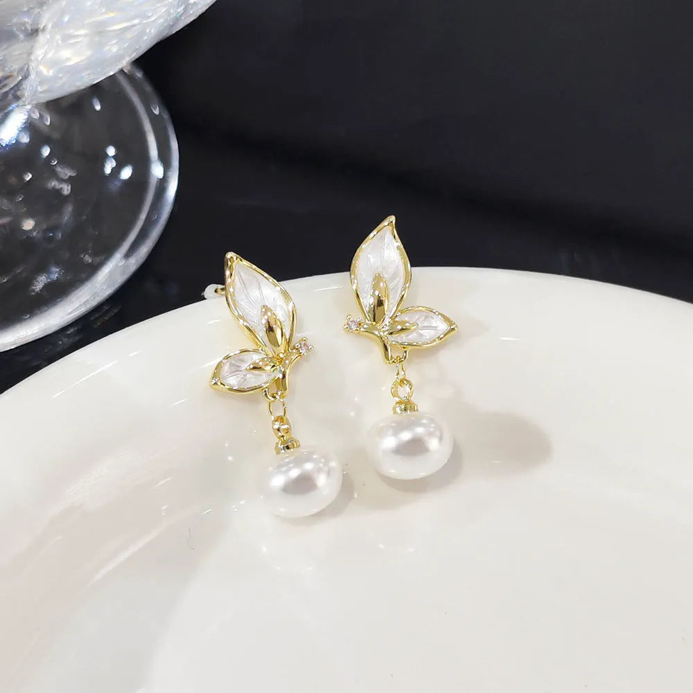 Copper butterfly drop earrings with electroplated finish and zircon painting oil detail, style PT0203.