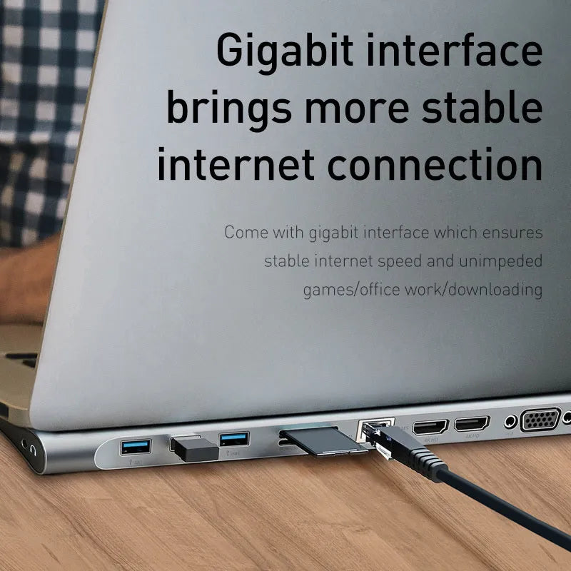 Grey aluminium USB C docking station with ten ports and an integrated laptop cooling bracket.