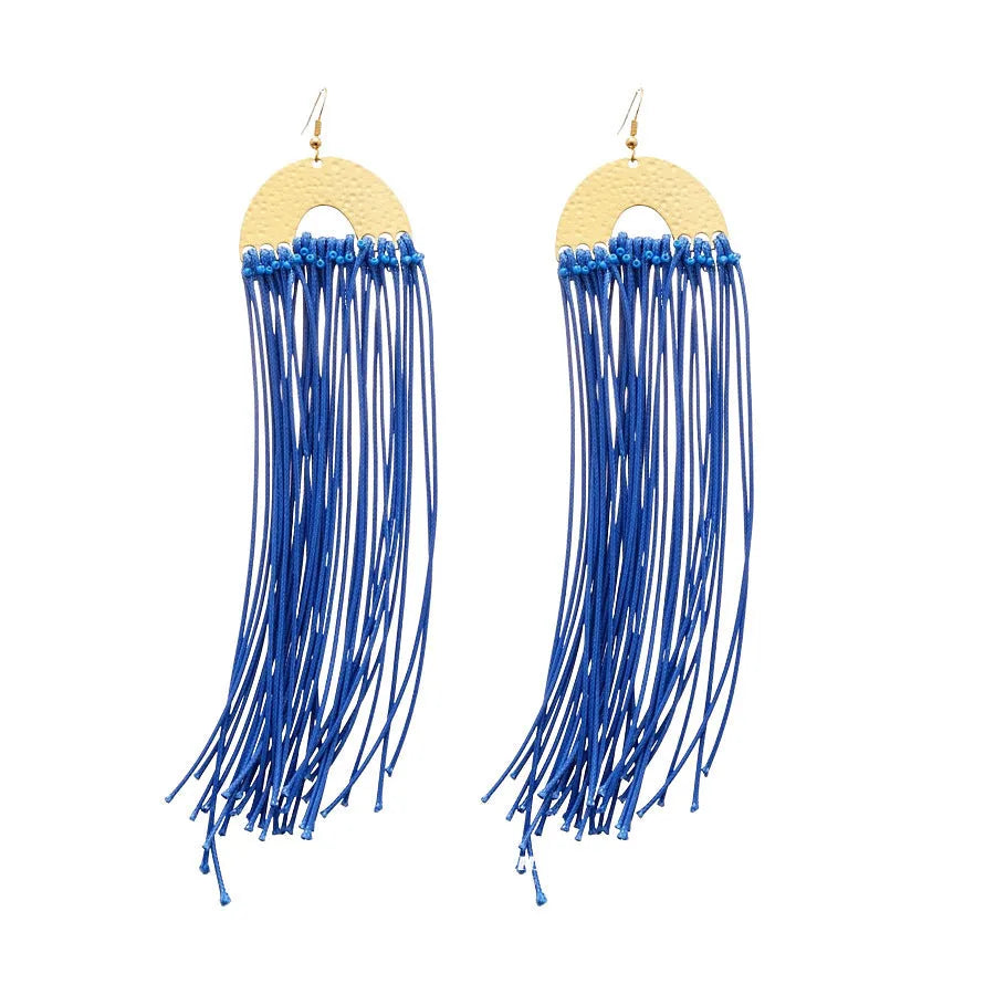 Geometric cloth hoop earrings with blue resin flower detail and manual processing