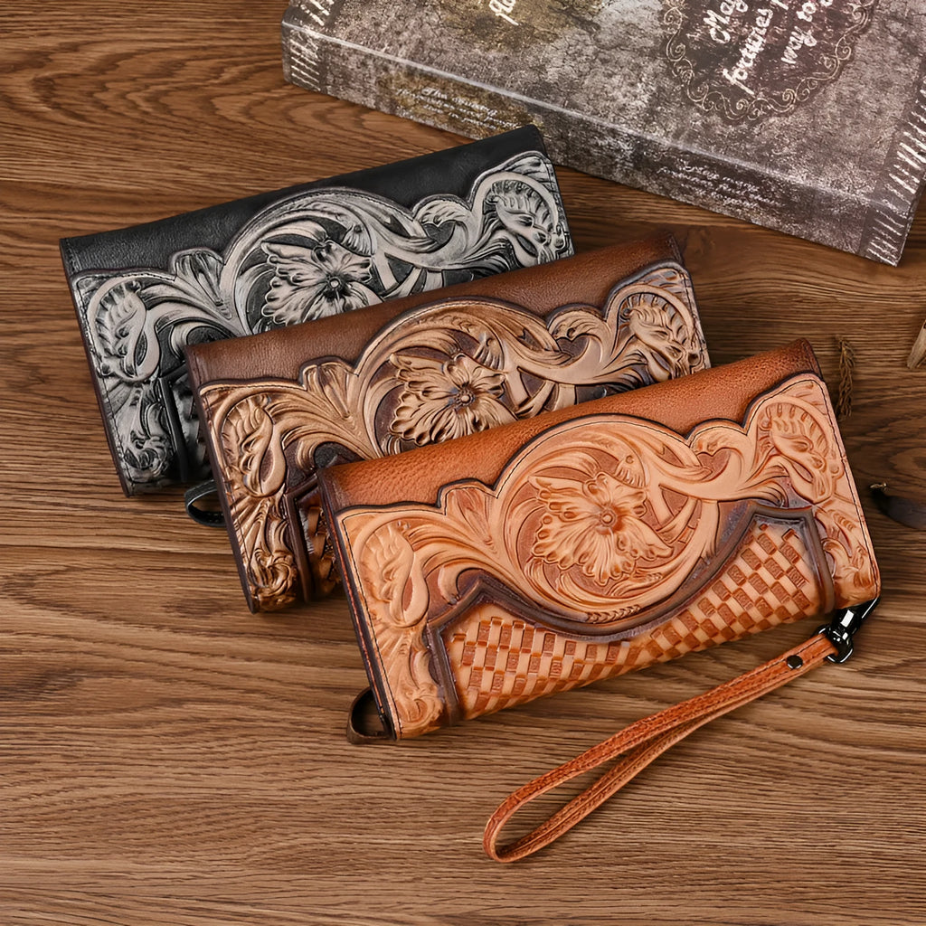 Brown genuine leather tri-fold wallet with embossed floral pattern, shown open to display compartments.