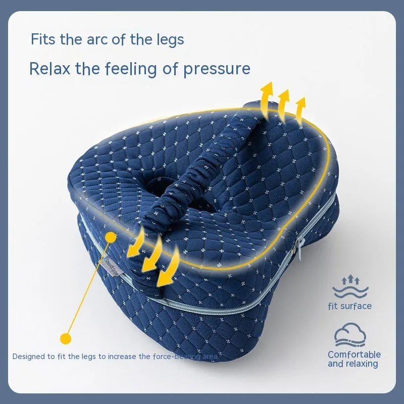 Heart-shaped memory foam leg pillow in dark blue jacquard colour, 25x23x13cm dimensions