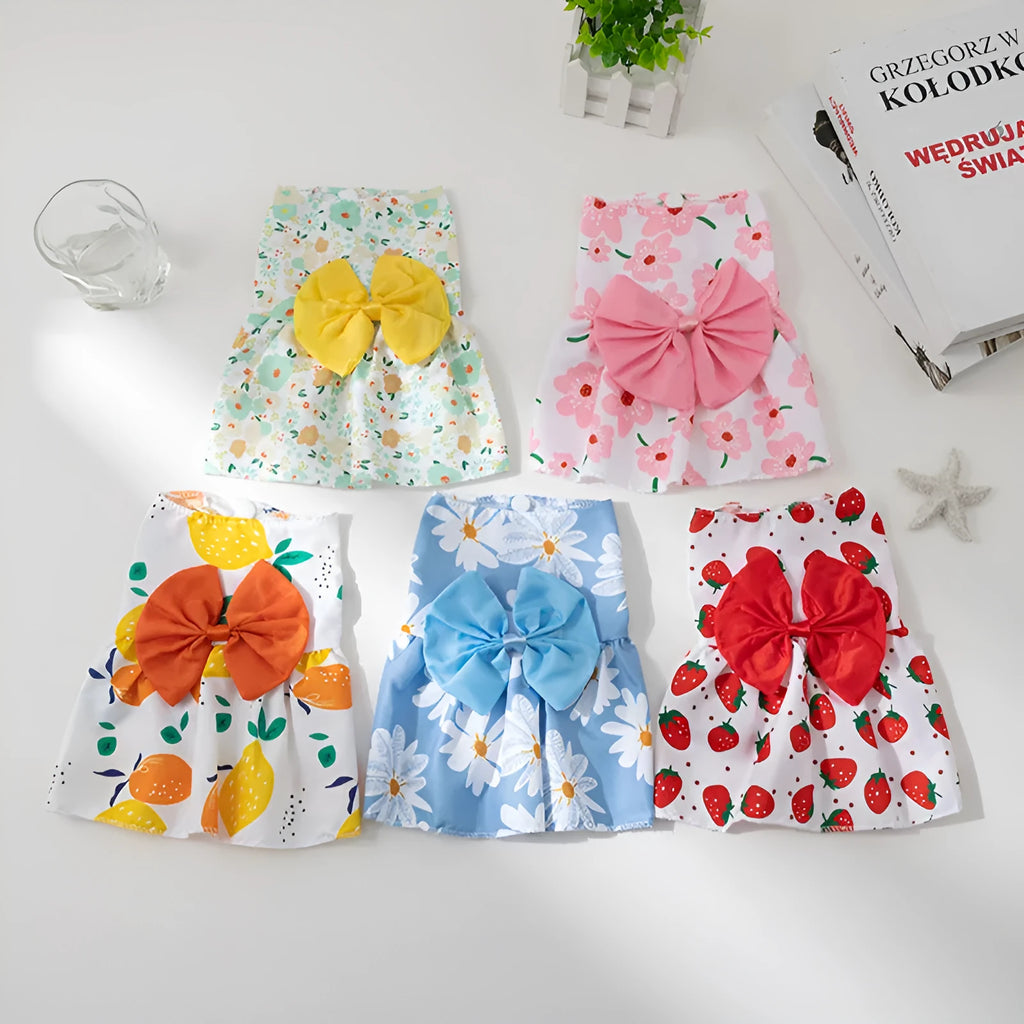 Orange bow floral butterfly knot ultra-thin polyester dress on a small dog.