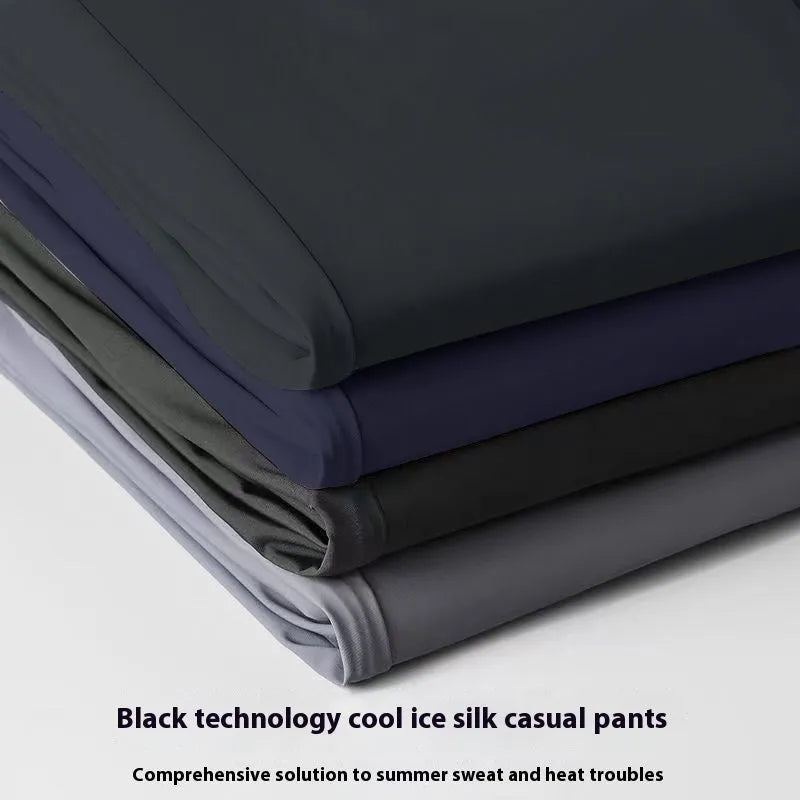 Men's black ice silk loose straight-leg casual trousers with elasticated waist on a plain background.