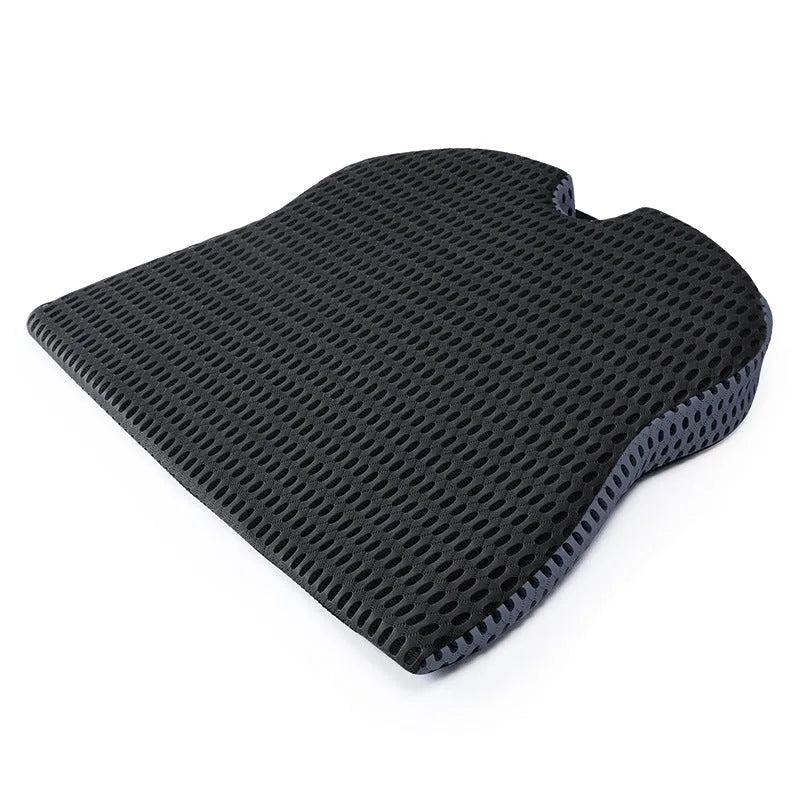 Memory foam car and office chair cushion with an attached fixed strap in a solid colour.