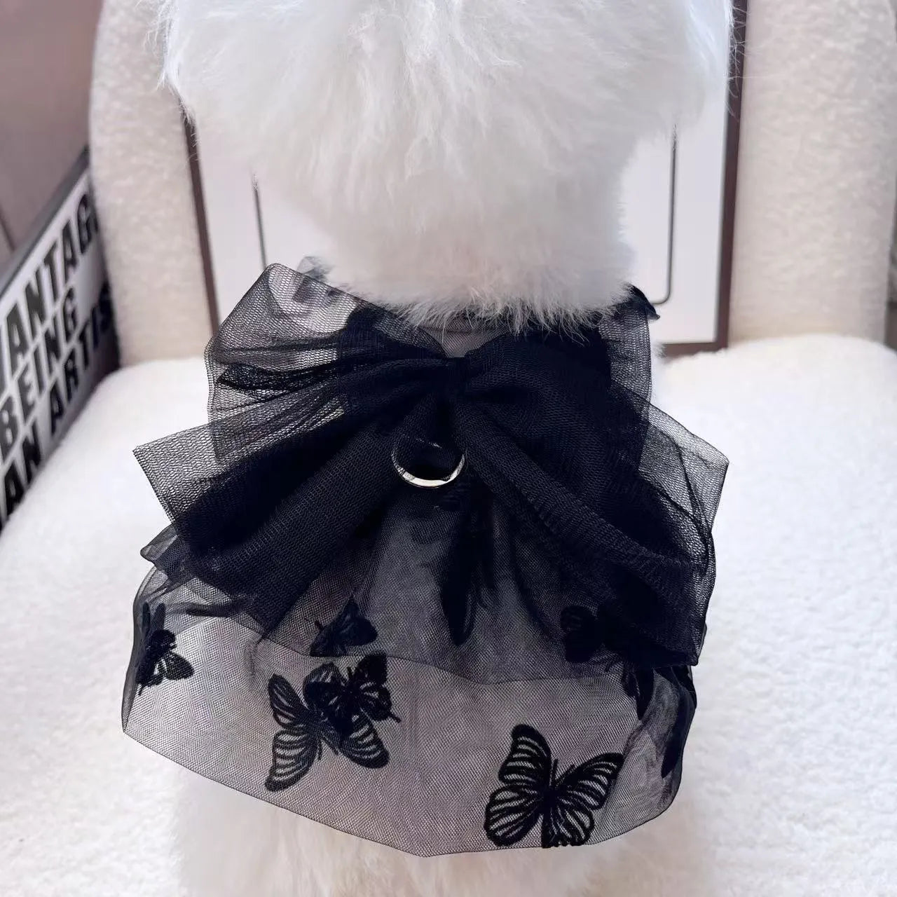 Black gauze princess tulle skirt for a small dog or cat, showing the pet clothing item.