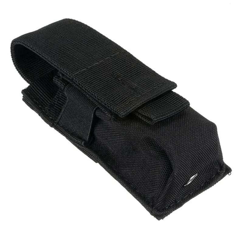 Black tactical MOLLE pistol magazine pouch with elastic cord closure, shown on a vest.