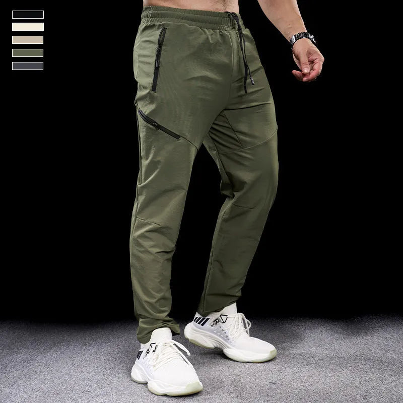 Men's waterproof quick-dry workout trousers in nylon fabric for sports and fitness