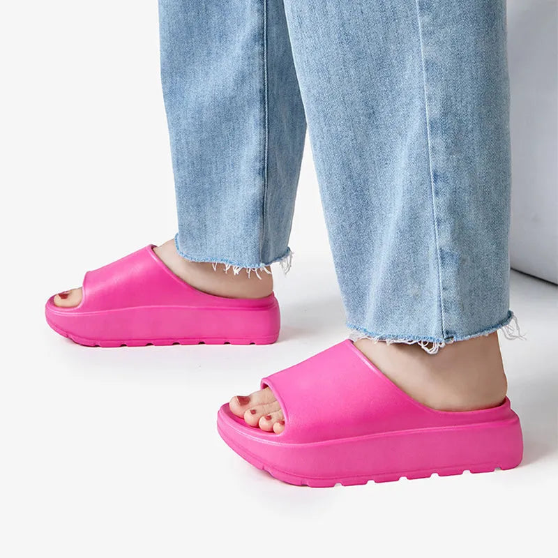 Women's beige thick-soled slippers with fish mouth pattern on 5.5cm EVA sole.