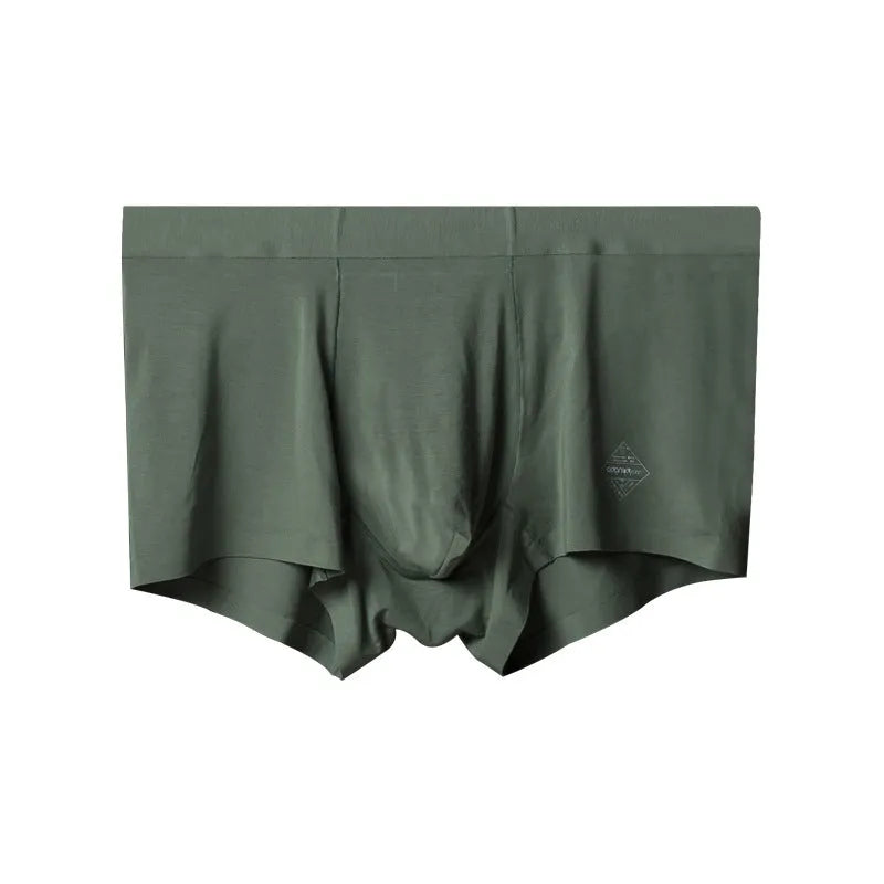 Men's seamless one-piece modal underwear in green, showing mid-waist fit and solid colour design.