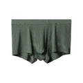 Men's seamless one-piece modal underwear in green, showing mid-waist fit and solid colour design.
