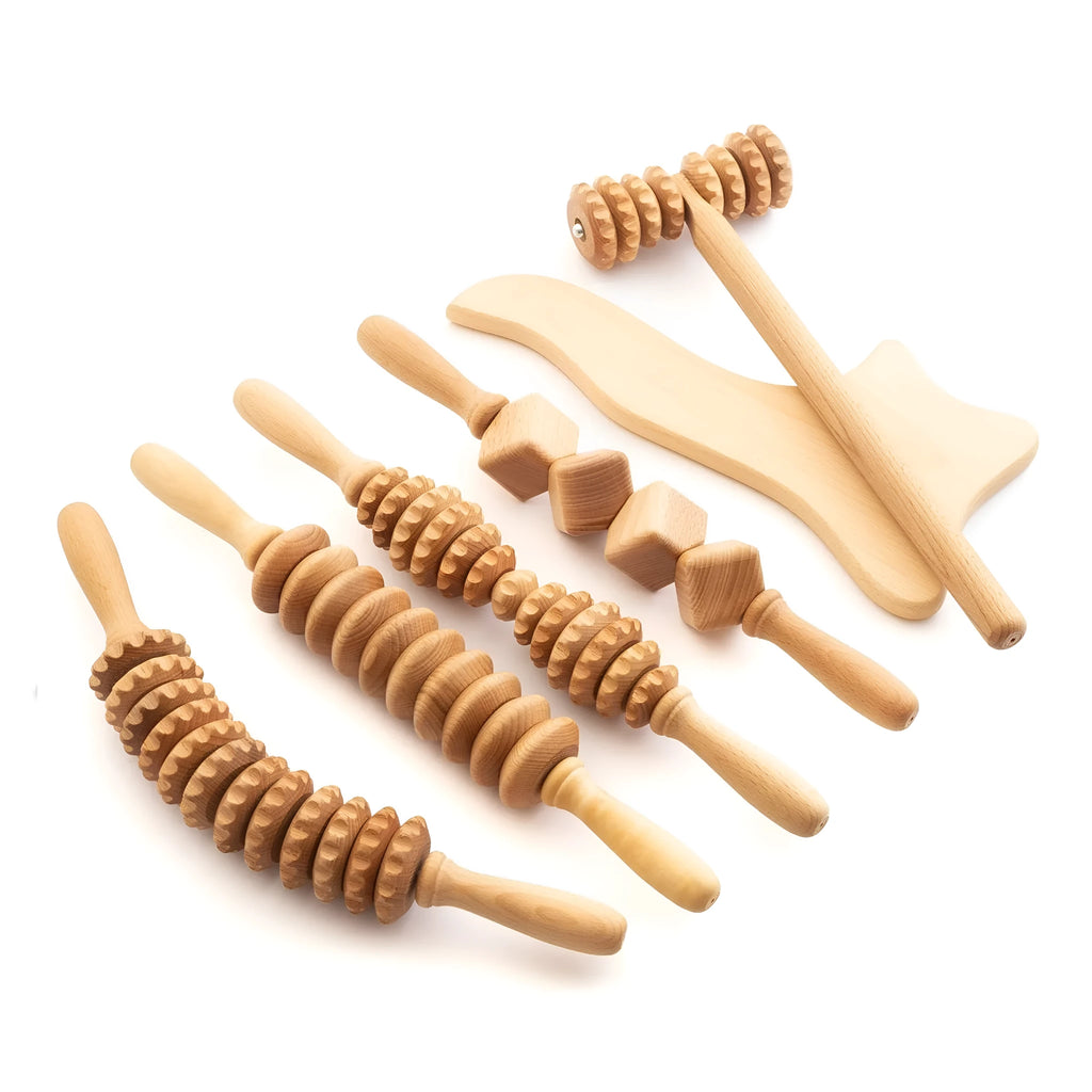 Beech wood massage roller set showing T-shaped and multiple wheeled rollers for muscle tension.