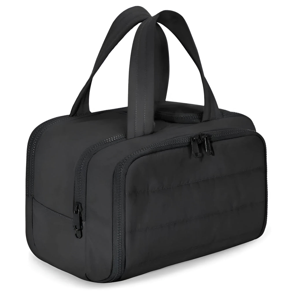 Large wide open travel toiletry bag in lightweight polyester with fluffy texture, showing interior space