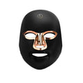 Rechargeable LED light therapy facial beauty mask in black, white, or rose gold trim.