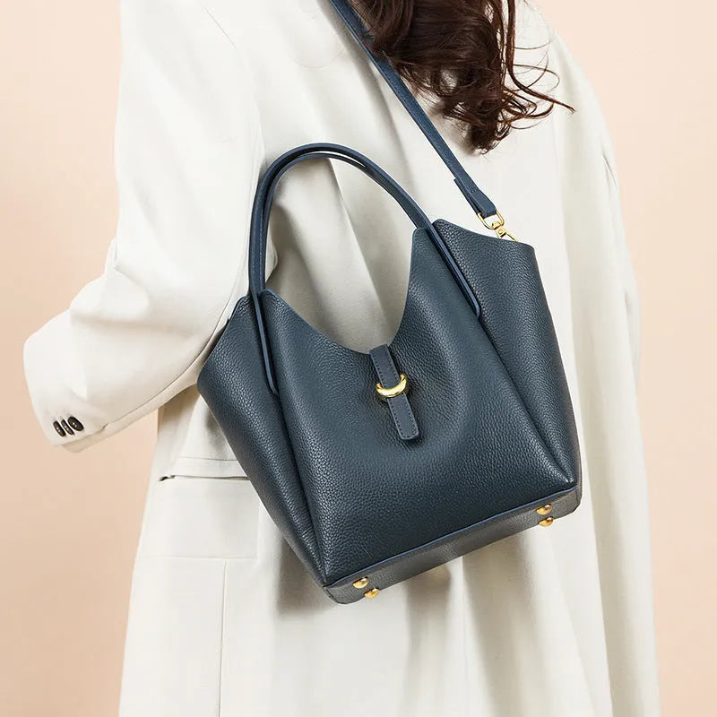 Genuine leather women's retro bucket handbag in beige colour showing sandwich pocket detail