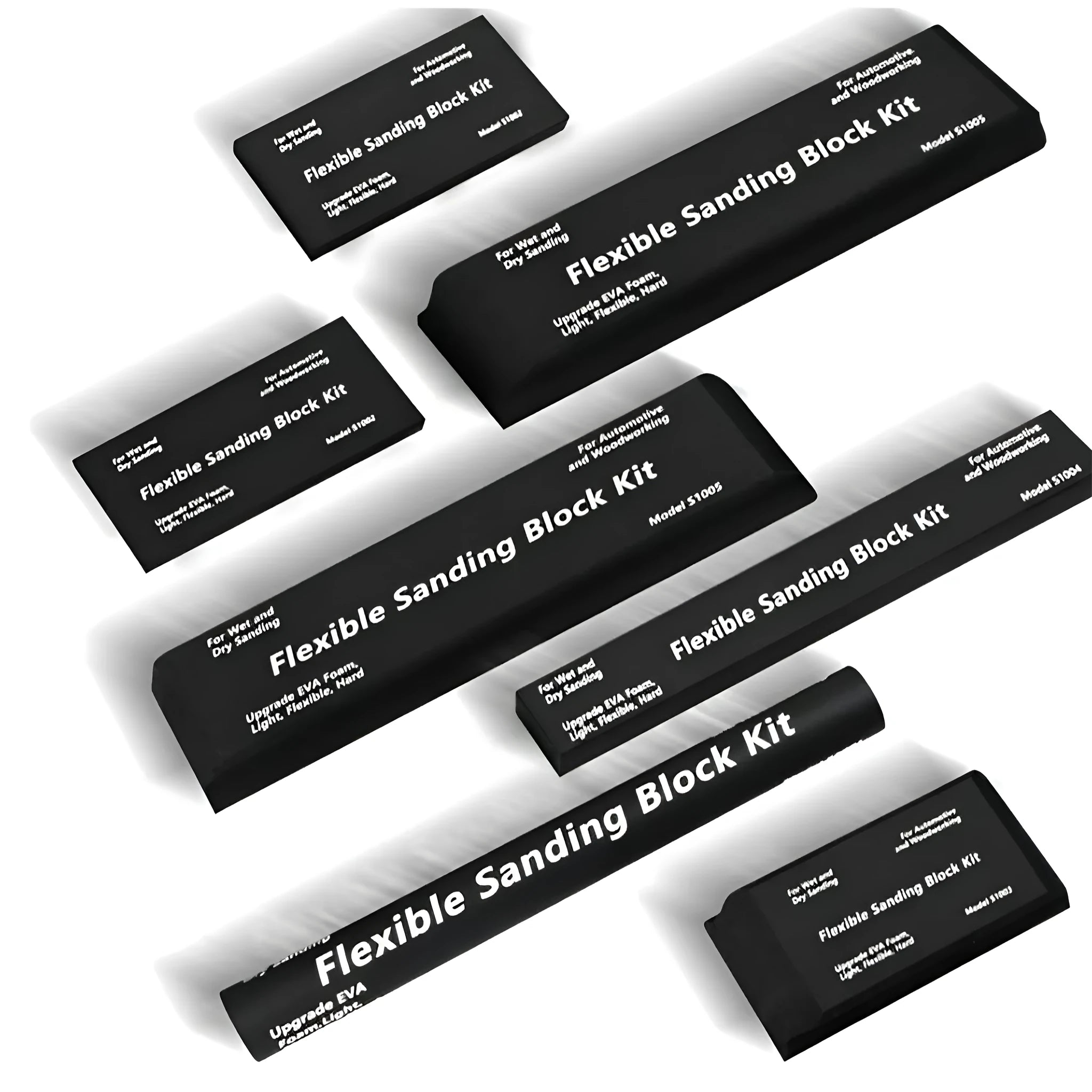 Set of seven identical black frosted metal building blocks for model making