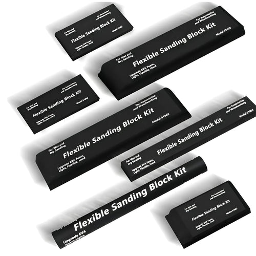 Set of seven identical black frosted metal building blocks for model making