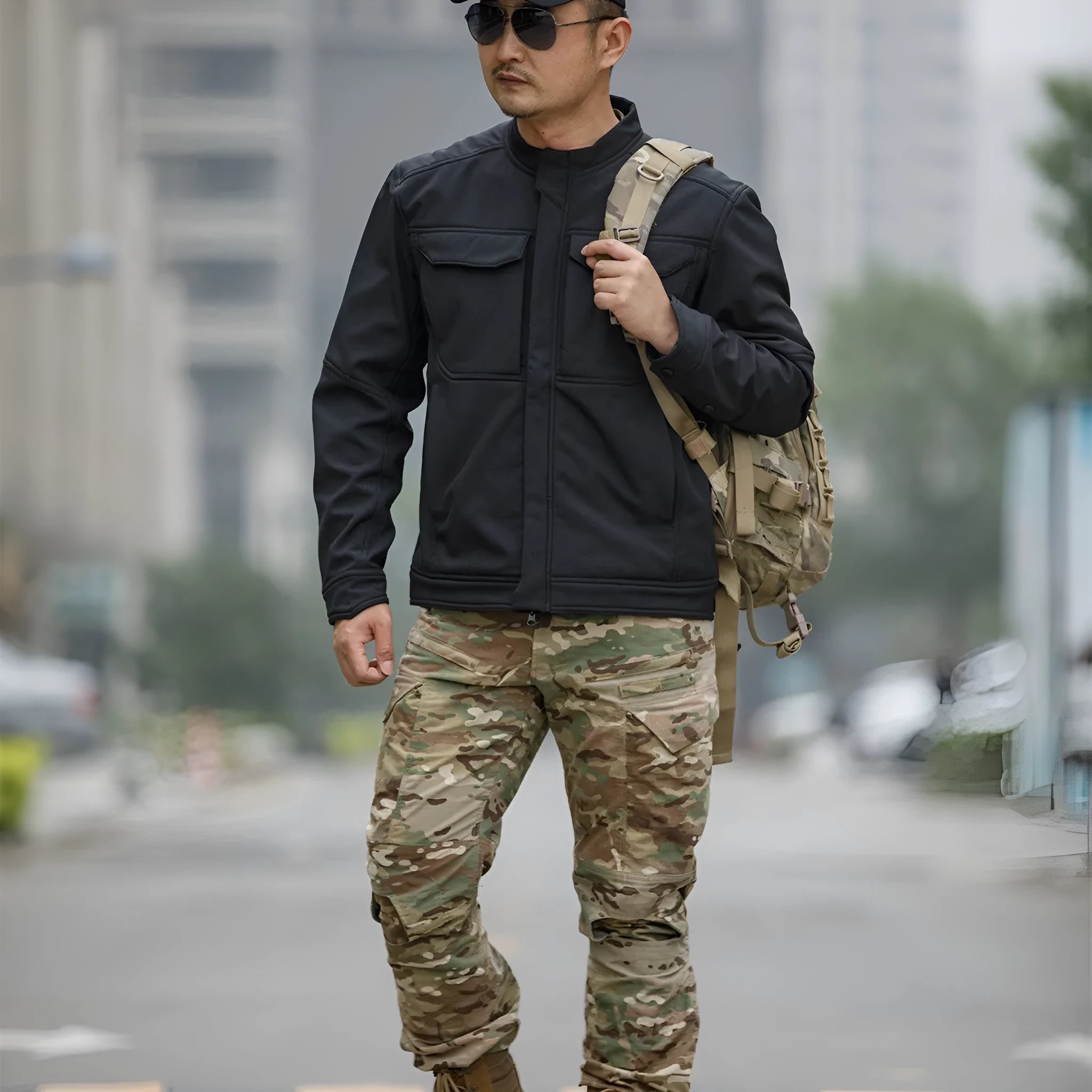 Bone Frog Peak Breaker soft shell tactical jacket in black, shown for outdoor mountaineering use.
