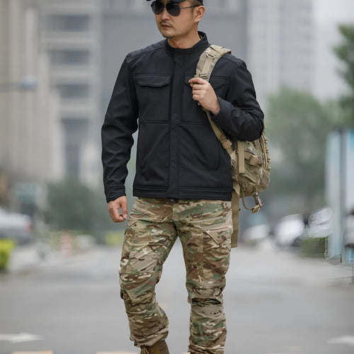 Bone Frog Peak Breaker soft shell tactical jacket in black, shown for outdoor mountaineering use.