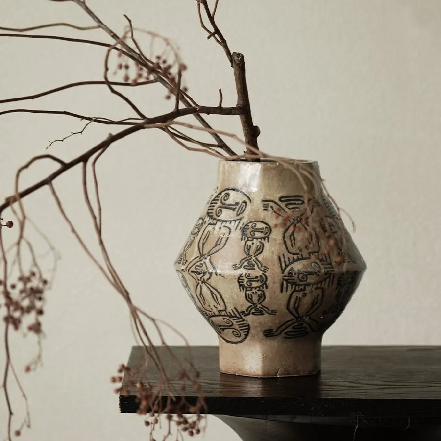 Hand-painted ceramic vase with tribal totem flower designs and vintage carved art patterns