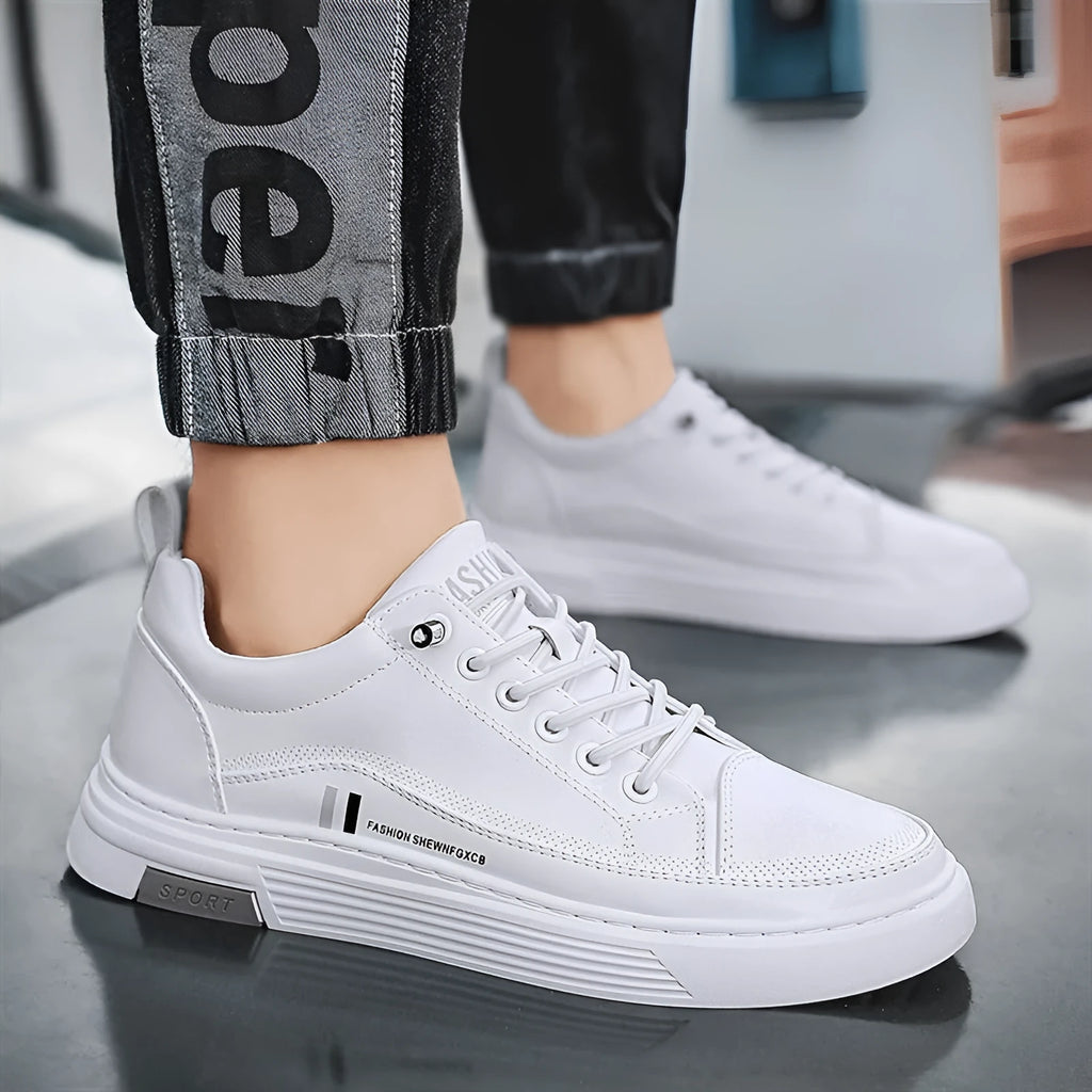 Men's white low-top skateboard shoes with elastic band closure and round toe