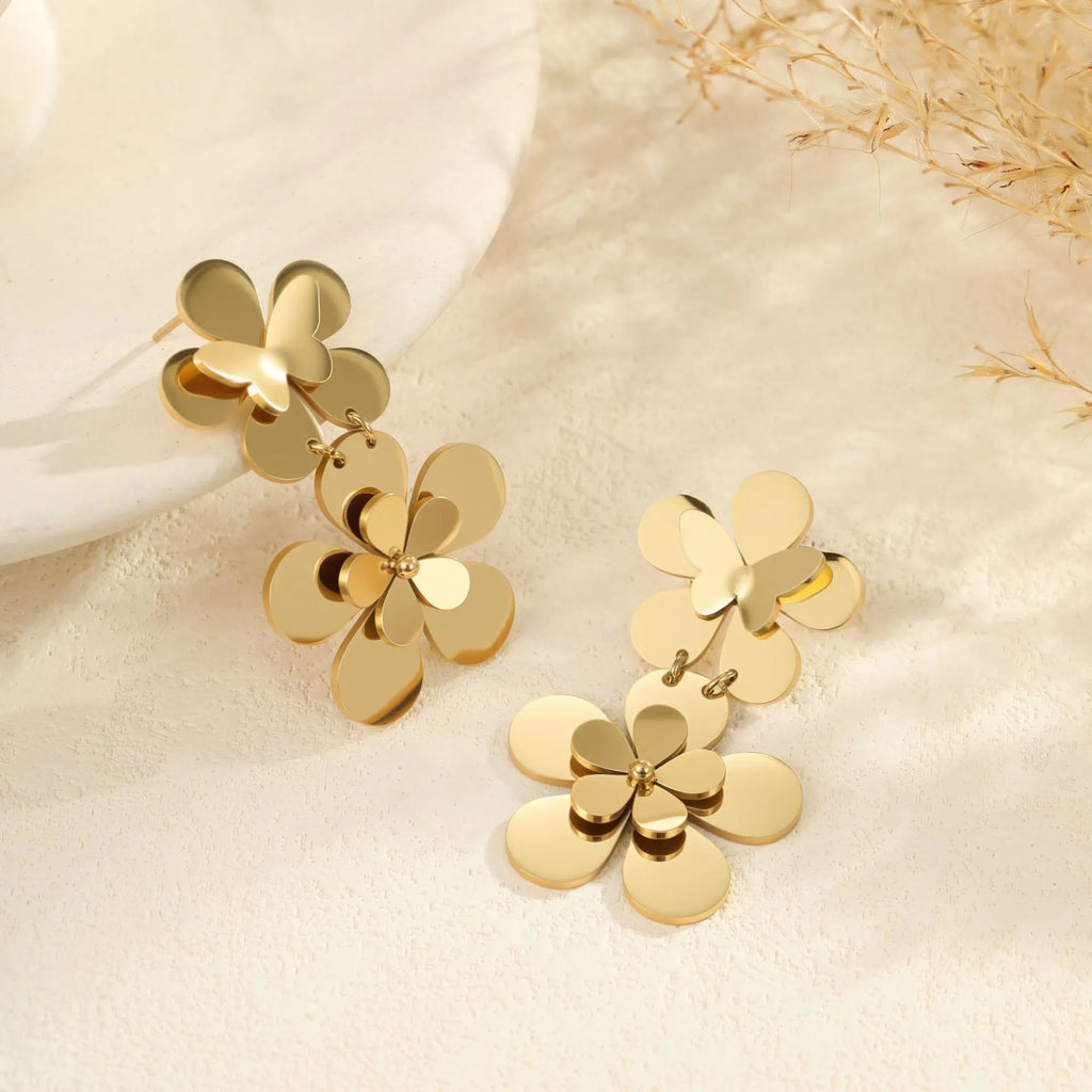 Gold-coloured butterfly earrings with flower and geometric designs for women