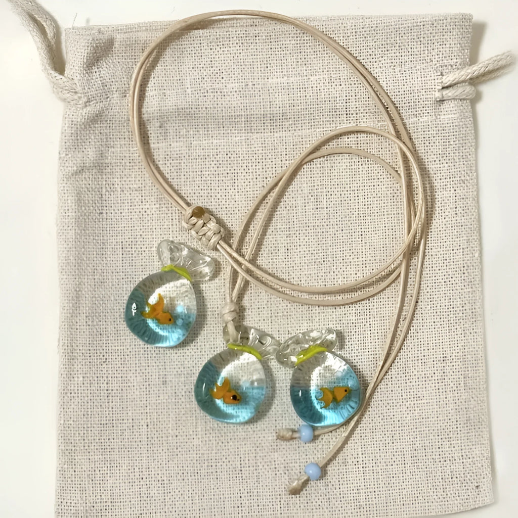 Women's coloured glaze pendant necklace with cotton linen chain featuring Skirt Everyday Joker design