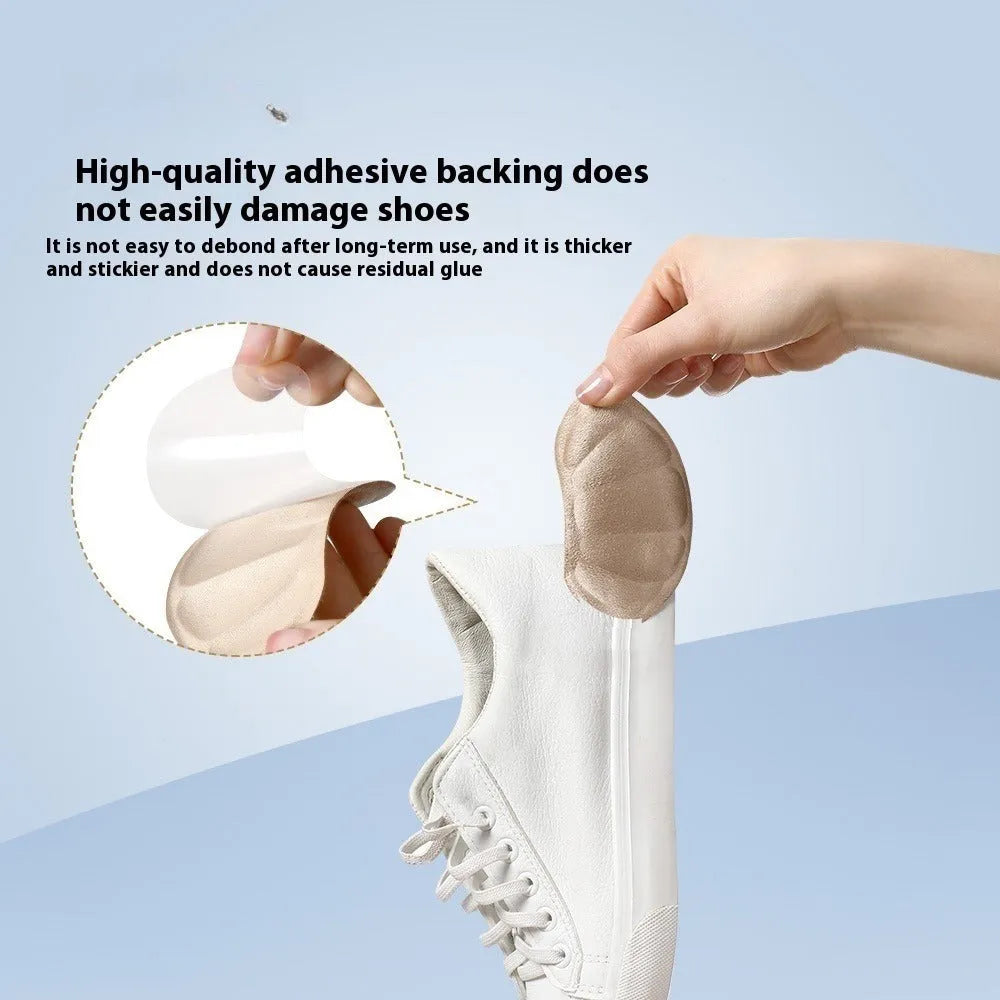 Three pairs of camel-coloured suede heel cushion pads with adhesive backing for shoes.