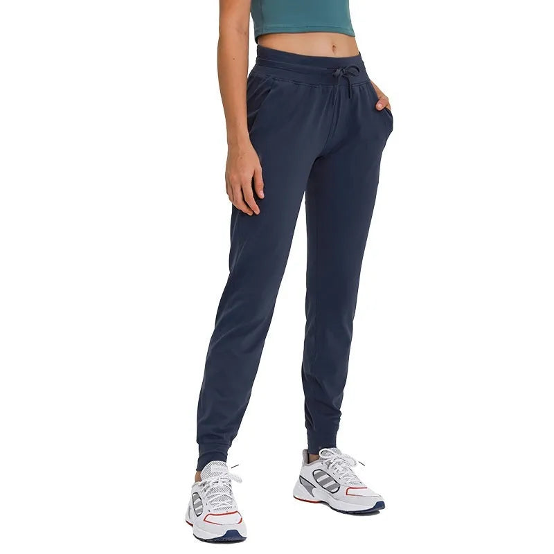 Women's high waist yoga pants with drawstring waistband in various colours