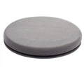 Circular grey rotating car seat cushion with plush fabric on a car seat.