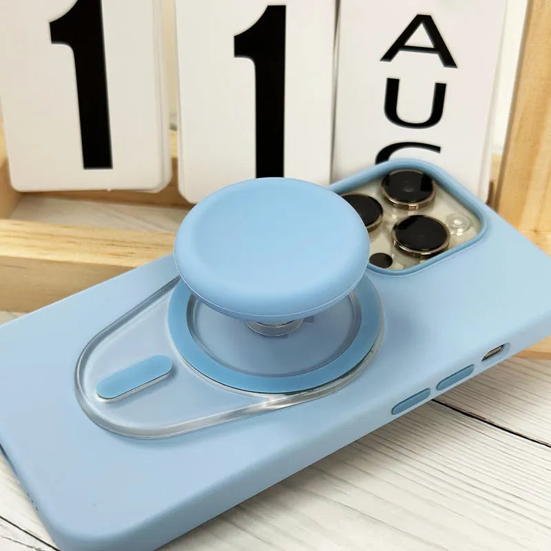 Magnetic suction telescopic folding phone bracket in white colour on desktop