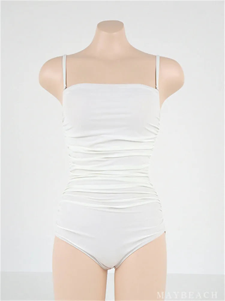 Sling style belly pleated one-piece swimsuit in blue, white, yellow, or black colours