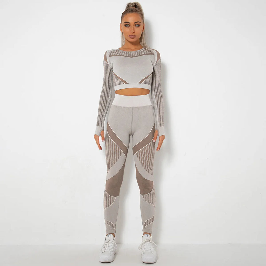 Woman wearing a long-sleeved seamless knitted yoga wearsuit in a stripe pattern, demonstrating a yoga pose.