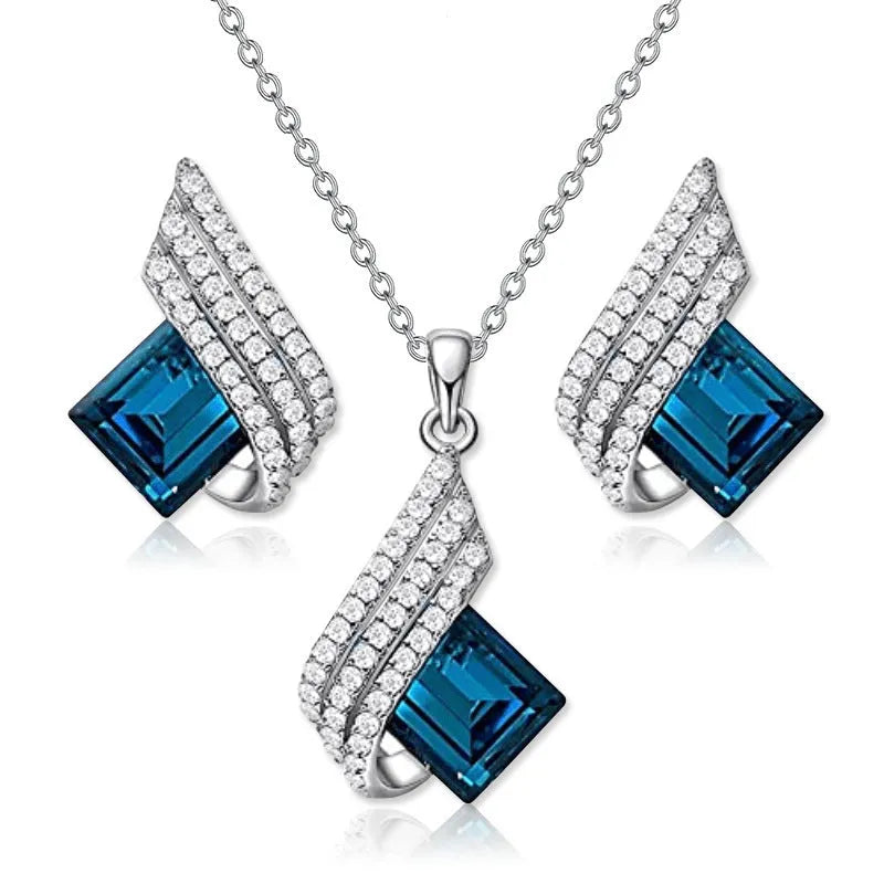 Alloy and glass necklace and earring set with cross chain design and electroplated finish