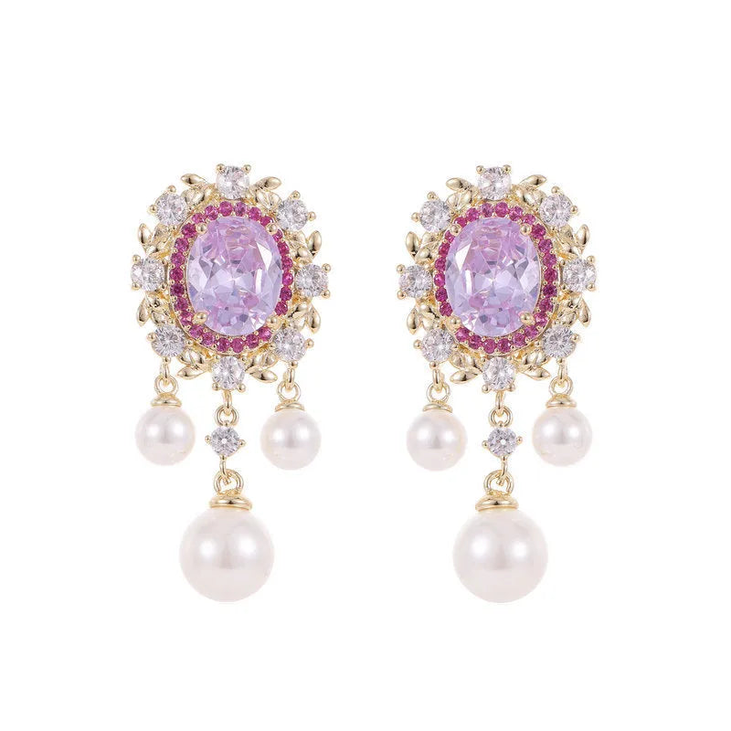 Oval zircon inlaid pearl tassel earrings in copper with geometric design and dangling elements
