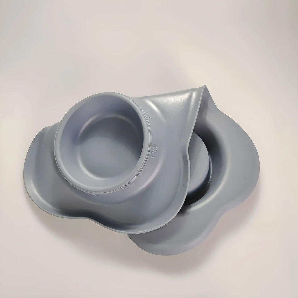 Large elevated silicone dog bowl with stainless steel insert in choice of colours on a kitchen floor.