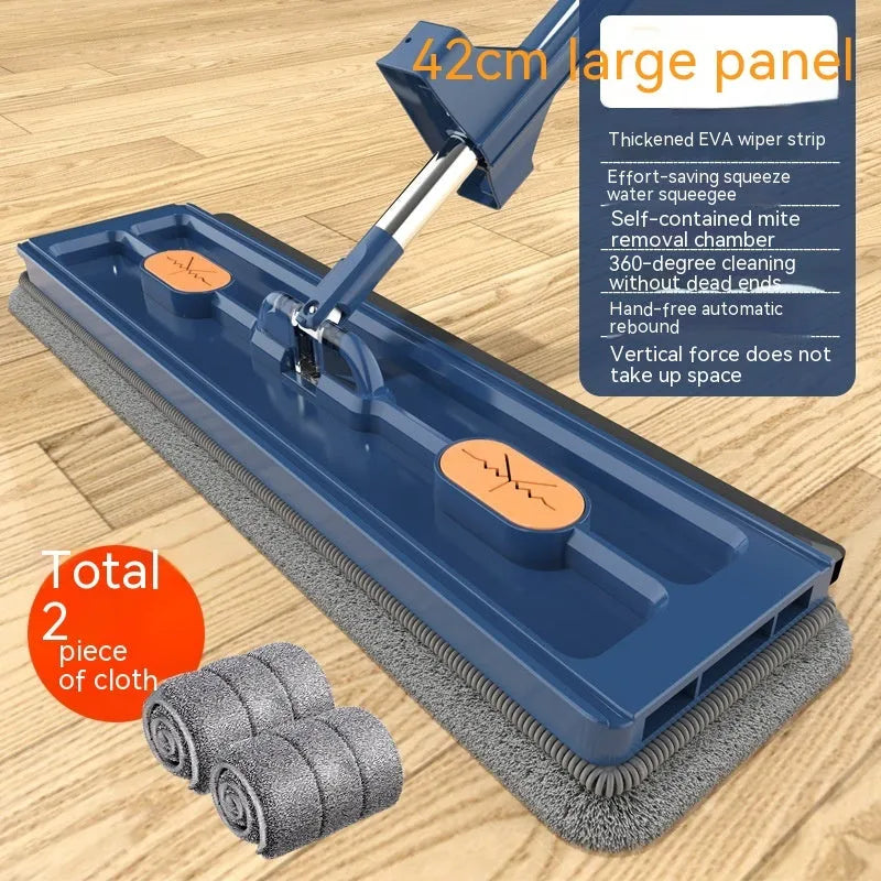 Large flat mop with long stainless steel handle and blue cleaning cloth on hard floor