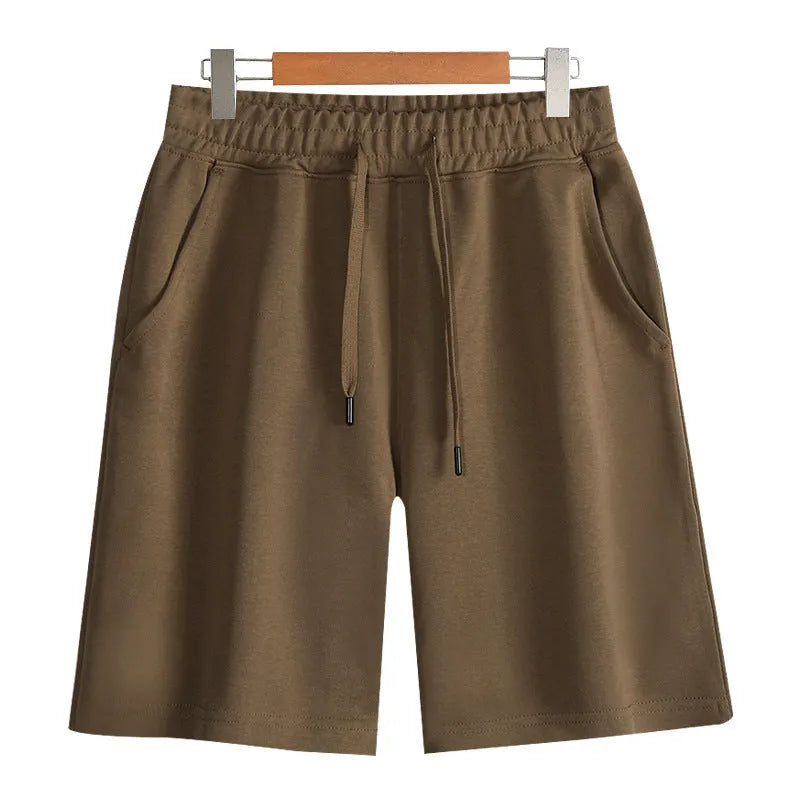 Cotton straight-leg summer shorts in light grey colour showing micro-elastic fabric texture